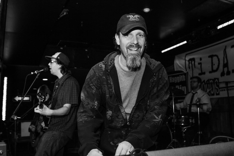 Greg Simpson of Maxx Graphix tweeks the sound during the third round of the VM Radio Battle of the Bands on Wednesday, March 18, 2015. Donna Hopper/SooToday