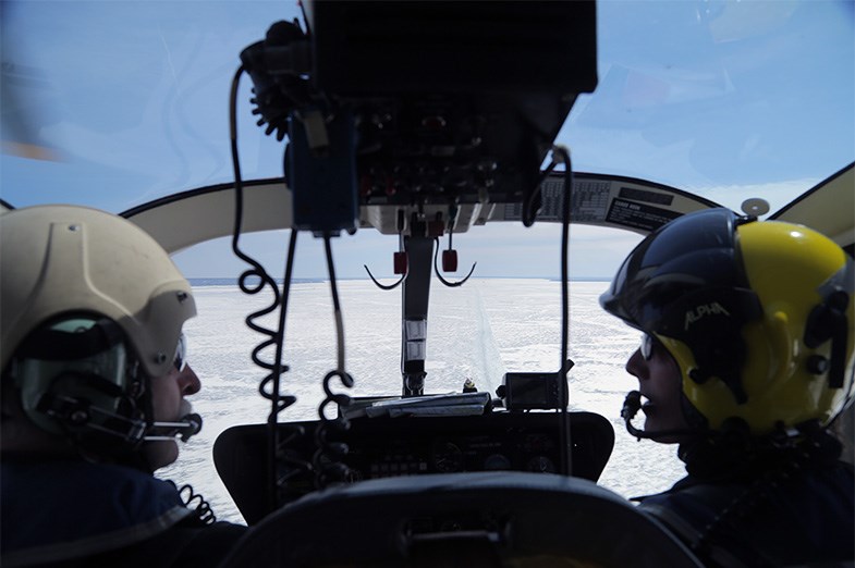 L-R Captain Dave Fowler (ret) and pilot Michel Dube seen during an aerial reconnaissance mission over Whitefish Bay on Lake Superior northwest of Sault Ste. Marie on April 7, 2015. Kenneth Armstrong/SooToday