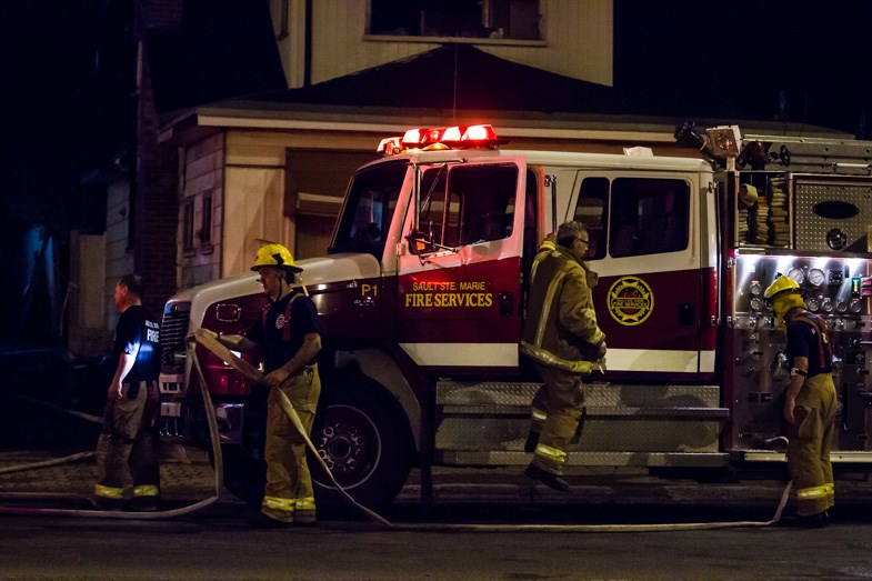Sault Ste. Marie Fire Services responded to a house fire on Wellington Street East near Gore Street late Friday, May 1, 2015. Donna Hopper/SooToday
