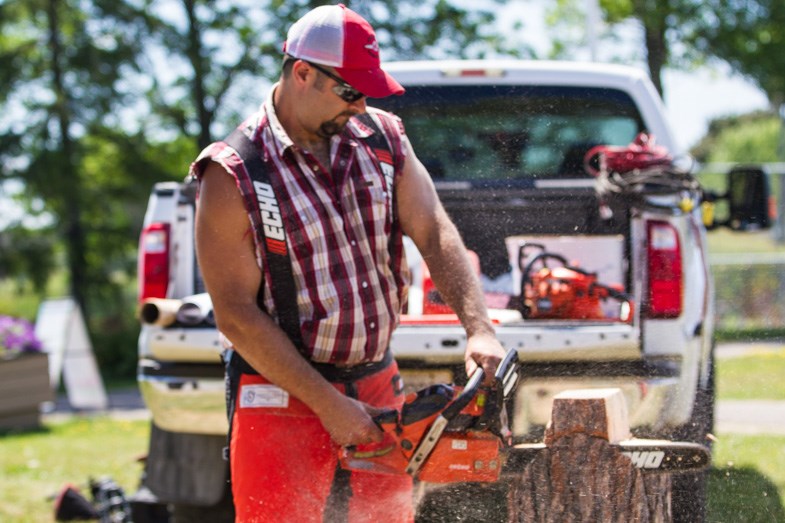 Jumberjack Steve Hebert demonstrates his chainsaw carving skills during a preview of the upcoming Cob and Cut festival on Wednesday, July 29, 2015. Donna Hopper/SooToday