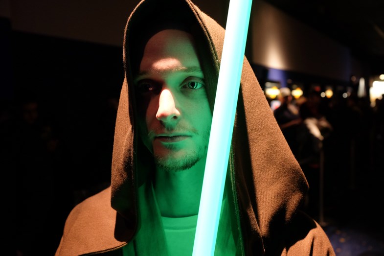Rudolf Gjos dressed as a Jedi Knight at the 2015 premiere of Star Wars: The Force Awakens in Sault Ste. Marie. Gjos runs Games Nook II in the Market Mall and attended the event with many of the people who hang out there. Photo by Jeff Klassen for SooToday