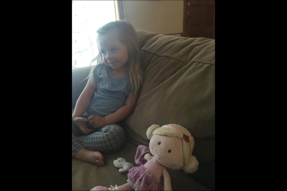 Addison Drake is shown with her doll Little Addison before she lost it in a Mackinaw City ferry parking lot in July.
