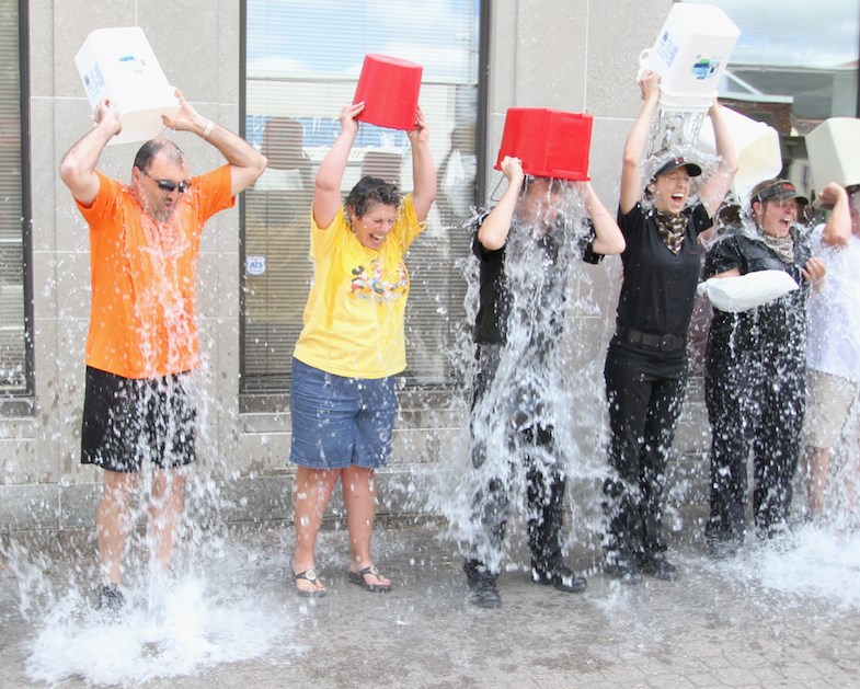 Sault MP Bryan Hayes, his staff and representatives from two local Tim Hortons franchises took part in the ALS Ice Bucket Challenge on Thursday, August 28, 2014. Donna Hopper/SooToday.com