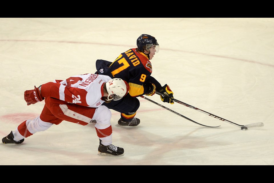 Alex Gudbranson of the Sault Ste. Marie Greyhounds tries to slow down Connor McDavid of the Erie Otters in the first period of Game 4 of the OHL Western Conference semi finals at Erie Insurance Arena on April 8. JACK HANRAHAN/