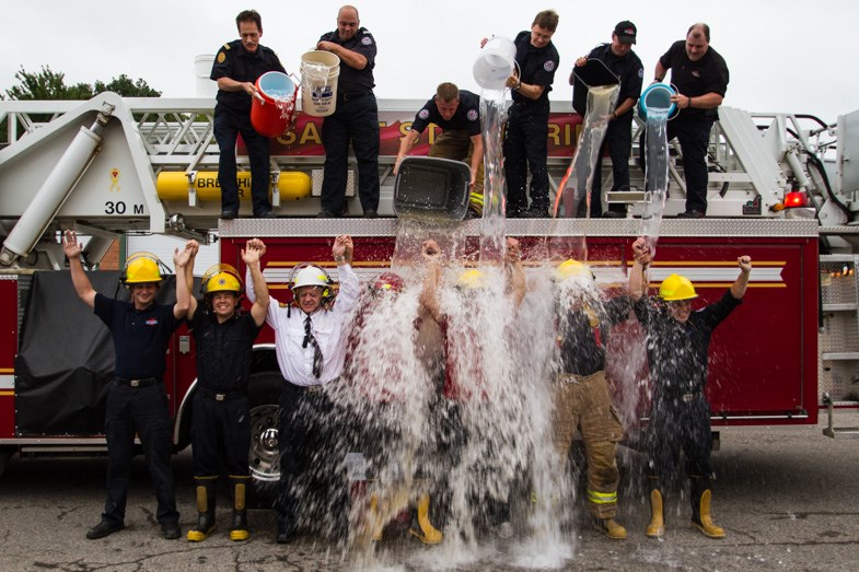 Sault Ste. Marie MPP David Orazietti joined members of the Sault Fire Services for the ALS Ice Bucket Challenge on Friday, August 29, 2014. Donna Hopper/SooToday.com