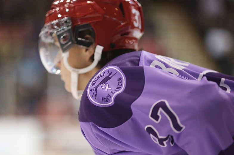 Greyhounds players wore purple jerseys as part of their Hockey Fights Cancer event during a game at the Essar Centre in Sault Ste. Marie on October 25, 2014. Kenneth Armstrong/SooToday