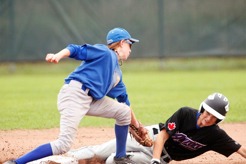 An Aurora Jays player slides safely into second base during a game Sunday against London. SooToday.com/Kenneth Armstrong