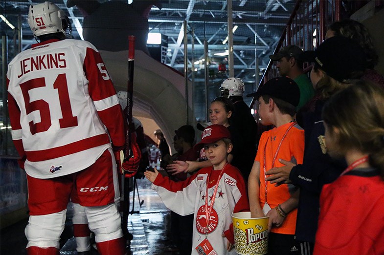 Young Soo Greyhounds fans greet player immediately before their home opener gamer against the Sarnia Sting on September 26, 2014 at the Essar Centre in Sault Ste Marie.Kenneth Armstrong/SooToday