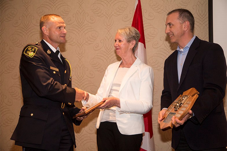 Constable Barry Kelly of the Ontario Provincial Police – Sault Ste. Marie Detachment receives his Officer of the Year award during the Sault Ste. Marie Chamber of Commerce 17th annual Police Services Awards Luncheon June 17, 2014 at the Delta Hotel in Sault Ste. Marie, Ont. SooToday.com/Kenneth Armstrong