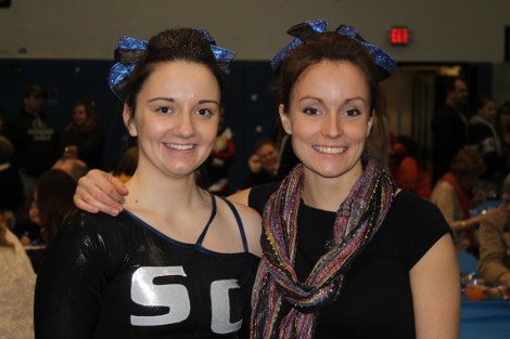 Danni Krumins with Cougars Cheerleading coach Caitlyn Nelson