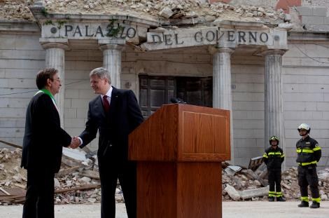 L'AQUILA, ITALY - Prime Minister Stephen Harper shakes hands with L'Aquila Mayor Massimo Cialente following the announcement of a Canadian-funded youth centre in the earthquake-ravaged region. PMO Photo by Jason Ransom 