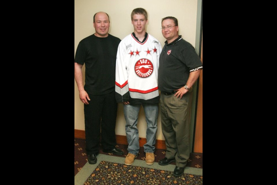 <b>Mike Rivard with Denny Lambert (left) and Dave Torrie (right).</b>