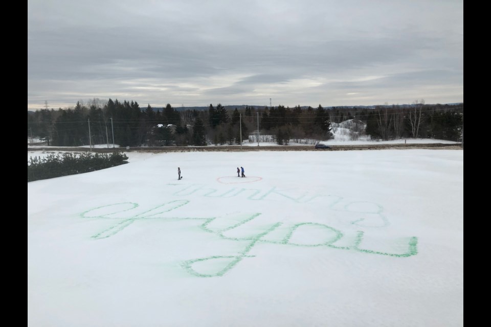 Anonymous snowshoers paint a heart and a message in the snow to F.J Davey Home residents. Photo supplied by Jeff Boyle