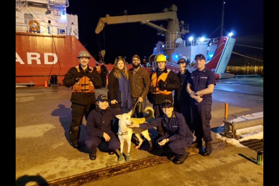 Logan was reunited with owners Kailaan Walker and Lydia Selin at the United States Coast Guard base in Cheboygan, Mich. Friday evening. The crew of the USCGC Mackinaw rescued the dog after it went missing on St. Joseph Island Dec. 24. Logan was found on Lime Island in Michigan 11 days later. Photo supplied