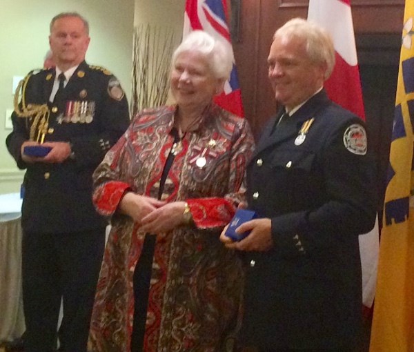 Brian Haines, Sault Ste. Marie paramedic, at right, received a 2017 Emergency Medical Services Exemplary Service Medal (first bar, for 30 years of service) from Ontario Lieutenant Governor Elizabeth Dowdeswell at a ceremony in Toronto, Oct. 23, 2017. Photo supplied.