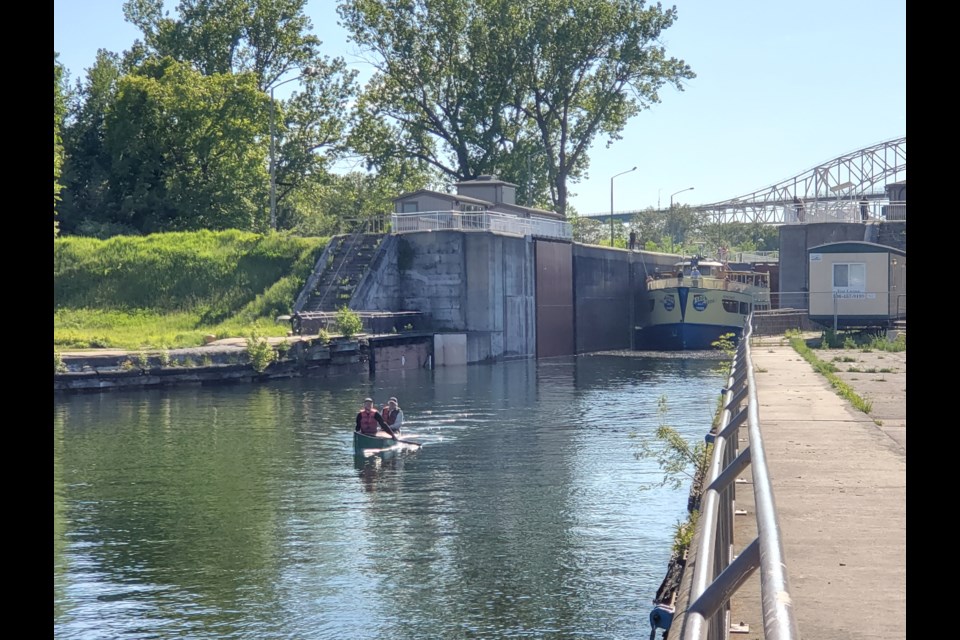 Dave and Dan Gardner clear the historic lock at the Sault Ste. Marie Canal National Historic Site.