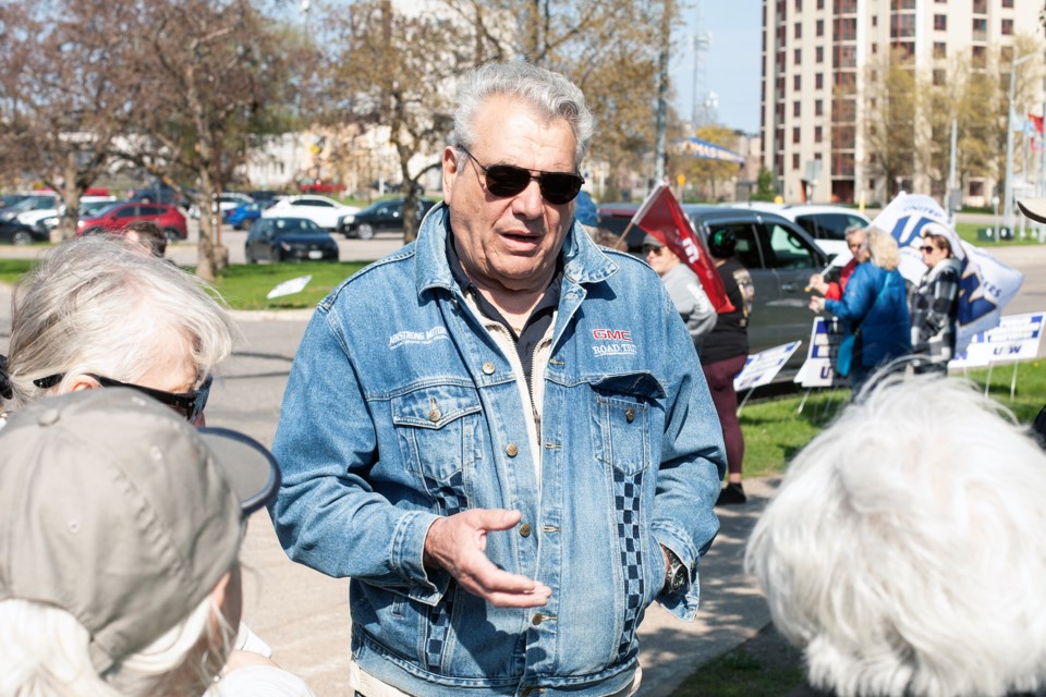 USW Local 2251 president Mike Da Prat speaks to fellow labour representatives during a health care demonstration outside yesterday’s city council meeting