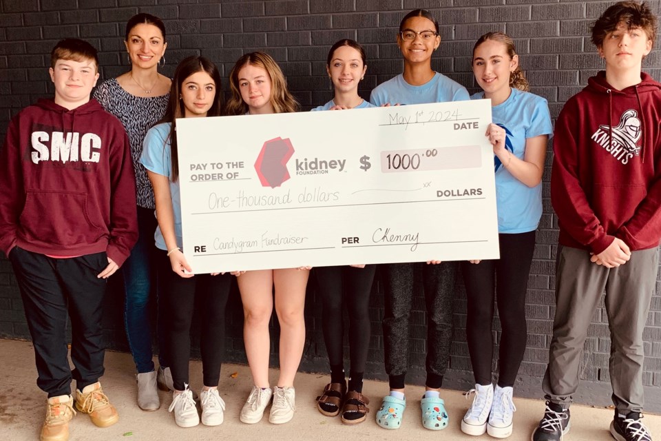 On May 1, the students of Our Lady of Lourdes presented a cheque for $1,000 to Tannis McMillan of the Kidney Foundation.