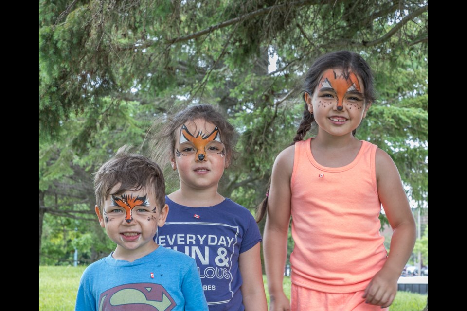 Maddox, Mackinley and Macey Boissoneau celebrate Canada Day at the Bondar Pavilion. Violet Aubertin for SooToday