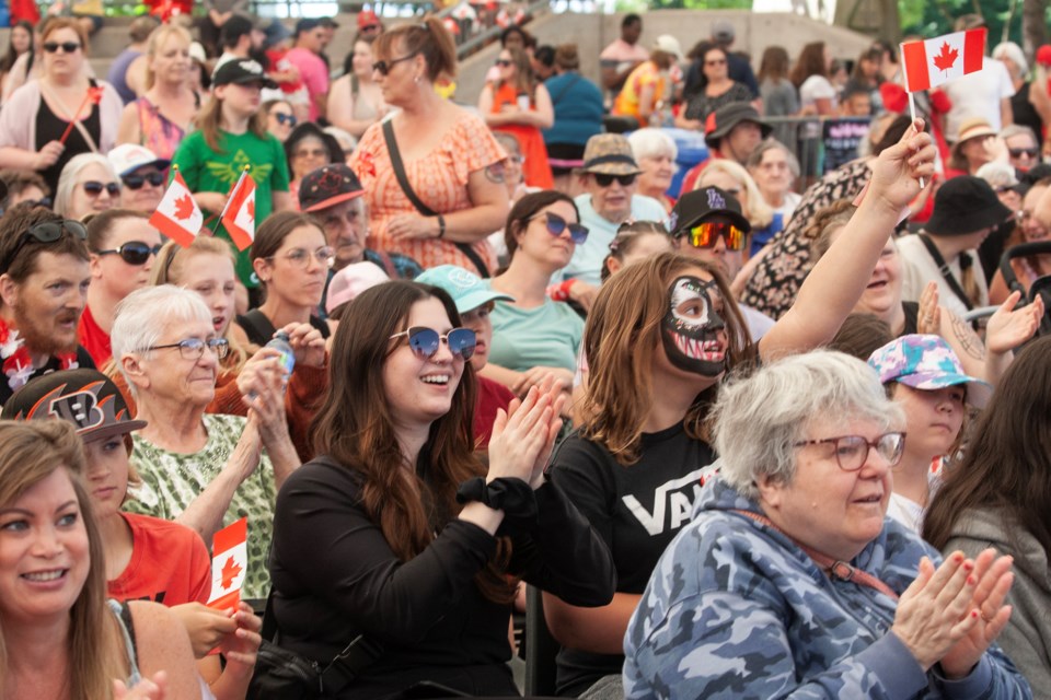 Children of all ages cheer for the magic show presented as part of the Canada Day celebrations at the Roberta Bondar Pavilion on Monday.