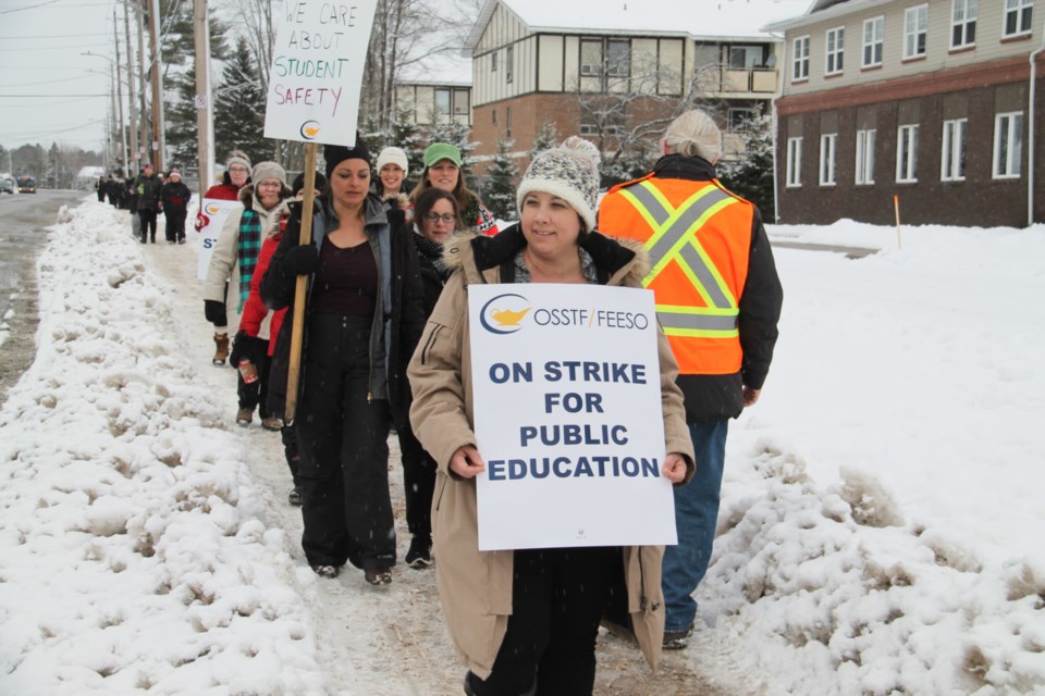 Algoma District School Board (ADSB) high school teachers and other education workers, represented by the Ontario Secondary School Teachers Federation (OSSTF), on a picket line outside White Pines Collegiate during a one-day strike, Dec. 4, 2019. Darren Taylor/SooToday