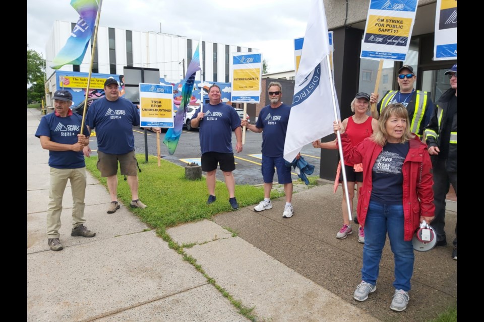 Striking safety inspectors gathered outside Sault MPP Ross Romano’s office calling for better pay and benefits, August 3, 2022.