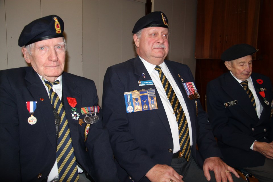Second World War veteran Fred Middleton of Sault Ste. Marie, at left, with Sandy Ross, Royal Canadian Legion deputy zone commander, and fellow Second World War veteran Kenneth Hocken at a ceremony at Royal Canadian Legion Branch 25, February 3, 2016. Middleton was presented with the French Legion of Honour Medal. Darren Taylor/SooToday