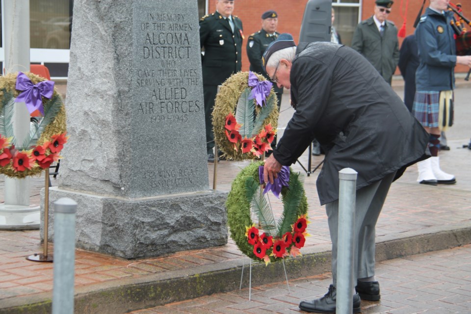 Elected officials, Royal Canadian Legion Branch 25, cadets and members of the public gathered at the Sault Ste. Marie Airport on a drizzly morning to remember pilots from Canada, the United Kingdom and other countries who died fighting off the threat of Nazi invasion of Britain in 1940 at the annual Battle of Britain memorial ceremony, Sept. 25, 2022. 