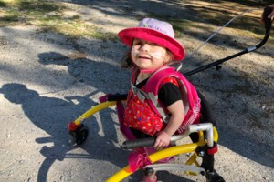 Girl with over 200 surgeries wants to ride a bike with her brother