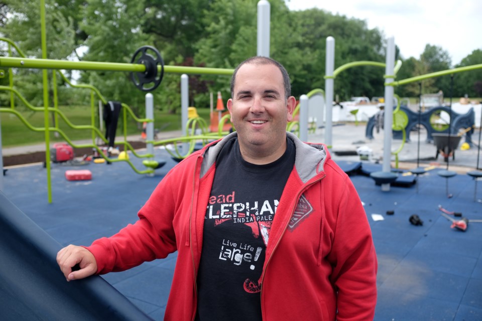 Algoma Autism Foundation Director Jamie Boston in front of the Adventure Playground and Interactive Sensory Play Area in Bellevue Park. The park opens Tuesday and on Monday Boston is hoping people will fill city hall in support of autism. Photo by Jeff Klassen for SooToday