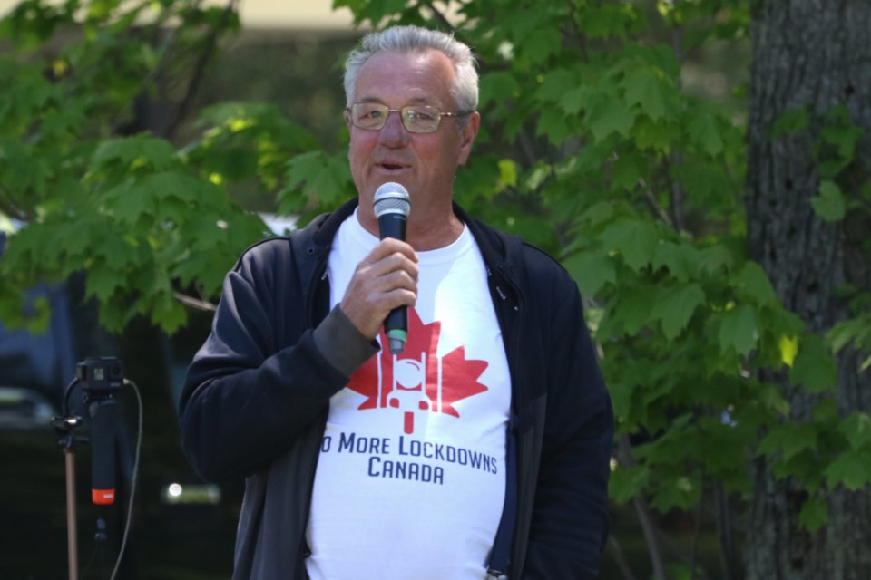Independent MPP Randy Hillier speaks to protesters at Bellevue Park Saturday. 