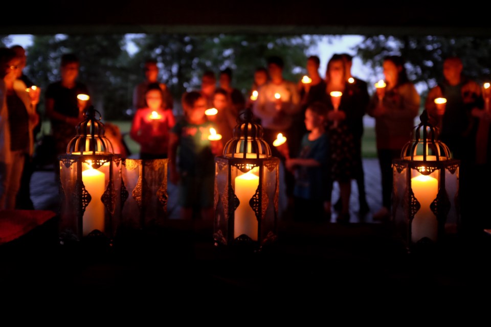 A candleight vigil commemorating those who live and have lived with HIV/AIDS was held in Bellevue Park on Sunday. Organizers lit three candles symbolizing  the past, present, and the future: those who have died from HIV/AIDS, those who live with those diseases, and the hope that someday we will live in a world without them. Photo by Jeff Klassen for SooToday