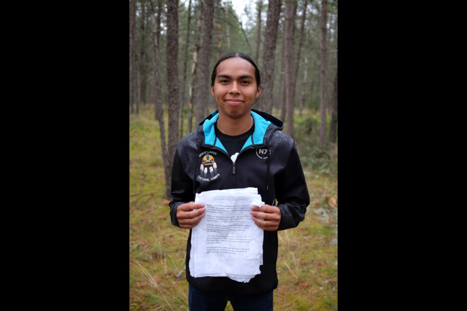 Noodin Niimebin Shawanda spoke on climate change at the Assembly of First Nations Annual General Assembly in Niagra Falls last week. He read it again in an outdoor setting on a rainy Sunday afternoon at the Great Lakes Gathering in Garden River. Photo by Jeff Klassen for SooToday