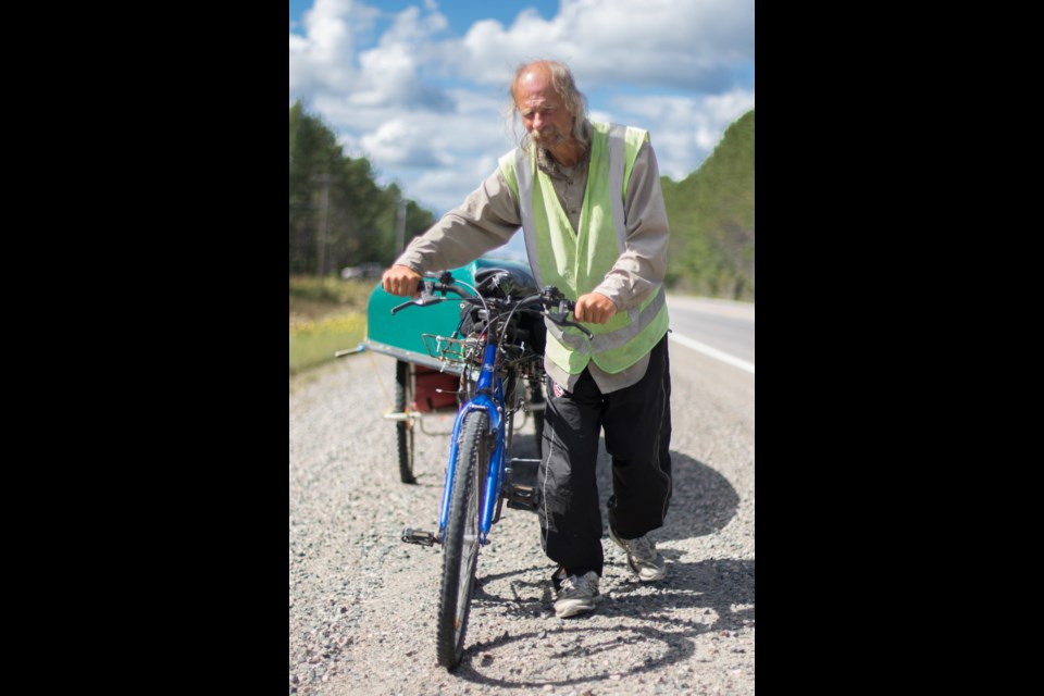 This man was last interviewed by SooToday on September 15 pushing a bicycle and canoe eastbound along Highway 17 near Espanola. Huron County OPP believe his body recently washed up on a beach north of Port Albert and are asking the public to help find his real name. Jeff Klassen/SooToday