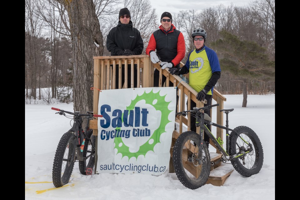 Peter Henry,  Brad Jarratt and Steve Wiacek seen Saturday during the Mulligan's Winter Trails open house. Violet Aubertin for SooToday 