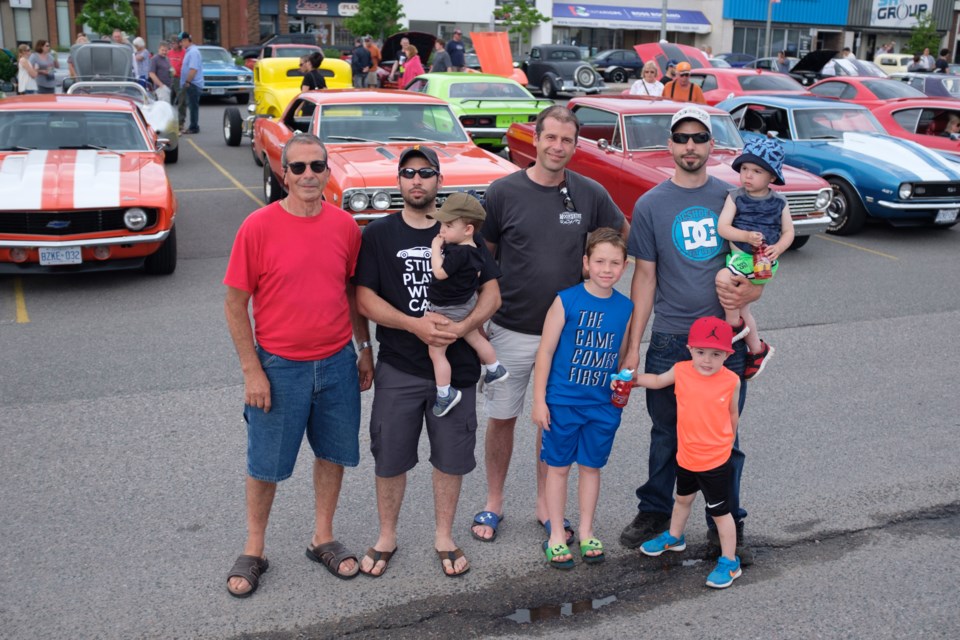 The Lepore family in front of just four of their vintage Chevrolet cars. (From left) Gino, Josh, Carson, Jeff, Lucas, Matthew, Logan, and Marcus. Jeff Klassen/SooToday