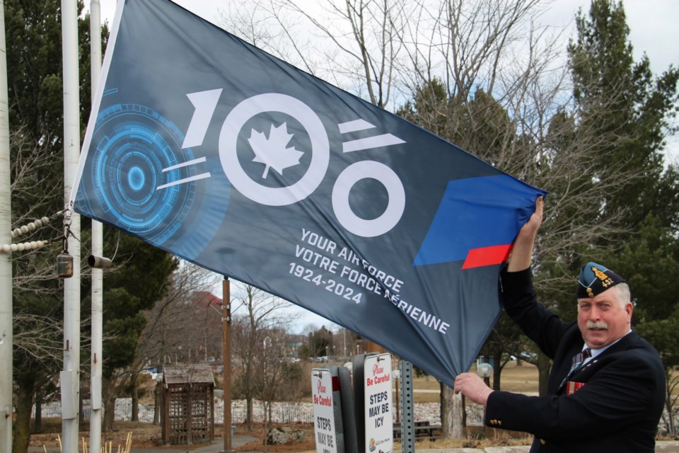 Steven Mullins, 432 (Algoma) Wing Royal Canadian Air Force Association board chair, helped raise the Royal Canadian Air Force’s 100th anniversary flag at the Ronald A. Irwin Civic Centre, April 5, 2024.