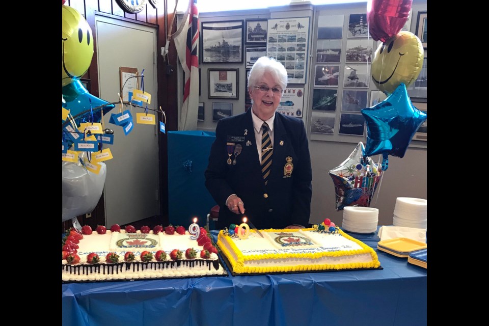 Wilma Oliver, Royal Canadian Legion Branch 25 president, slices the cake at the local Legion branch’s 90th anniversary celebration, May 5, 2018. Photo supplied by Royal Canadian Legion Branch 25