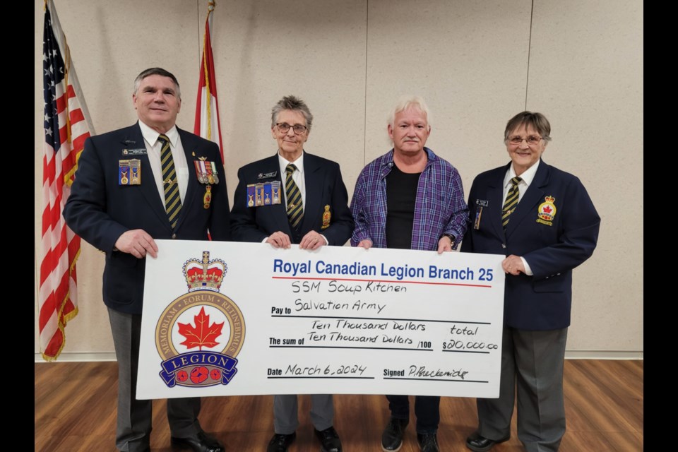 Pierre Breckenridge, Royal Canadian Legion Branch 25 president, Helen Stewart, past president and Branch manager, Ron Sim, Sault Ste. Marie Soup Kitchen Community Centre general manager and Betty Irvine, Branch secretary at a cheque presentation of $10,000 each for the Sault Ste. Marie Soup Kitchen and Salvation Army food bank, March 6, 2024.