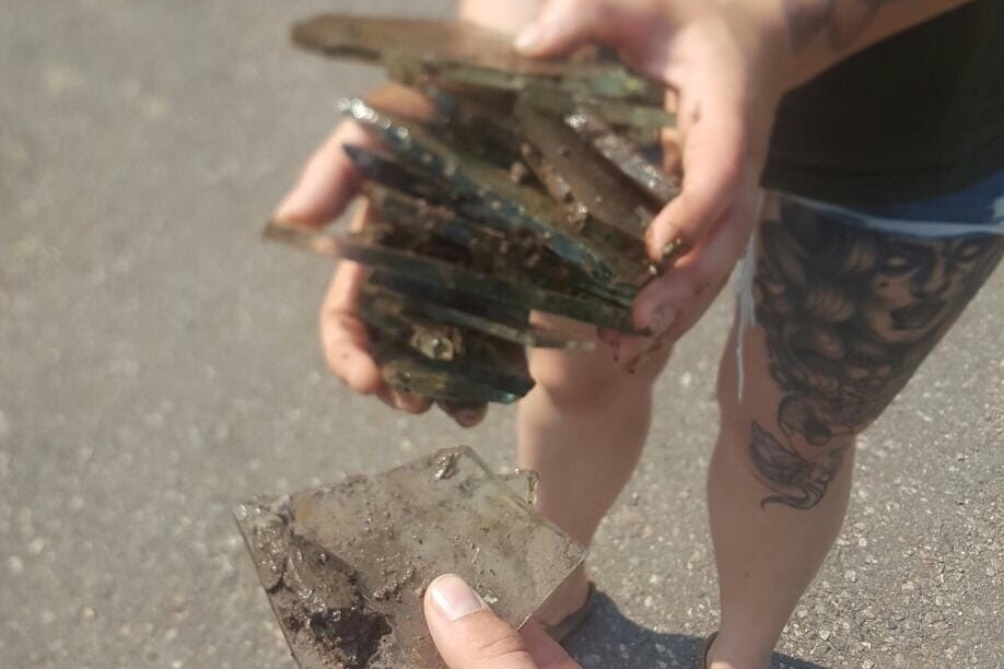 Glass fragments found on Thursday, July 25, 2019 by Chelsea Van Hoof in the Bellevue Park duck pond. Facebook 