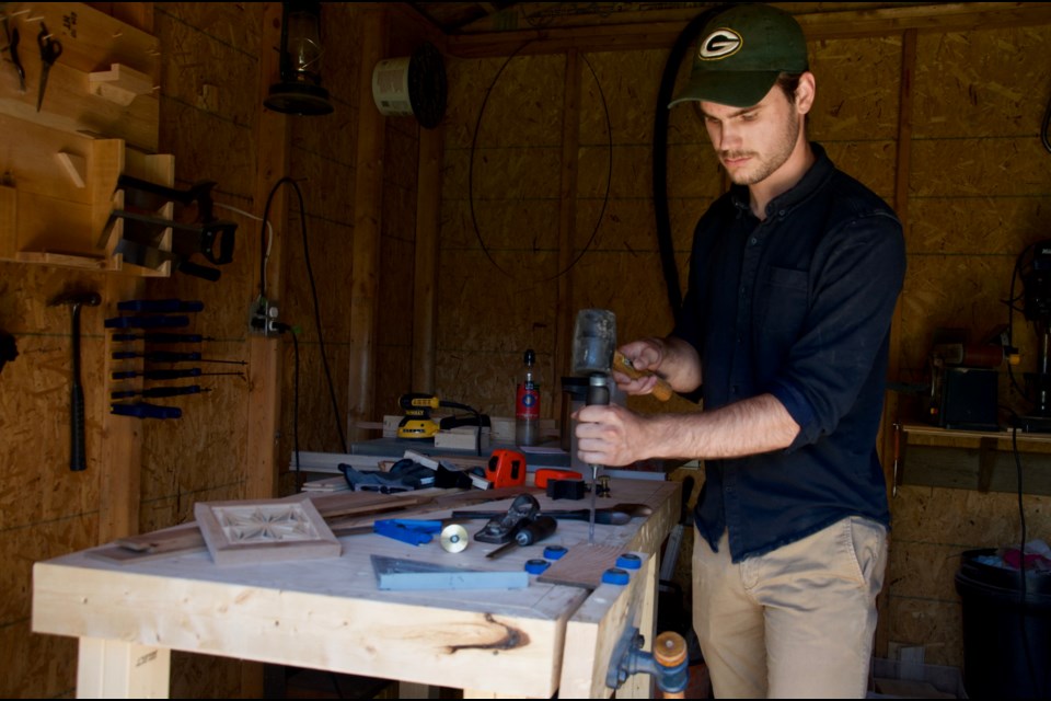 Graham Slater's plans to work at a summer camp fell through, so the Algoma U. student turned to his woodworking skills. Photo supplied