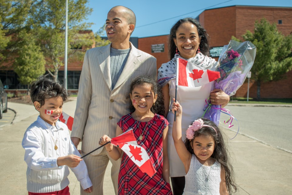 Members of the Laroulette family became Canadian citizens on Wednesday at a Citizenship Ceremony held at White Pines Collegiate & Vocational School. (From left) Damyen,6, Gilbert, Anne Danaëlle, 7, and mom Anne all joined youngest daughter Anne-Gayle, 4, as Canadian Citizens. Jeff Klassen/SooToday