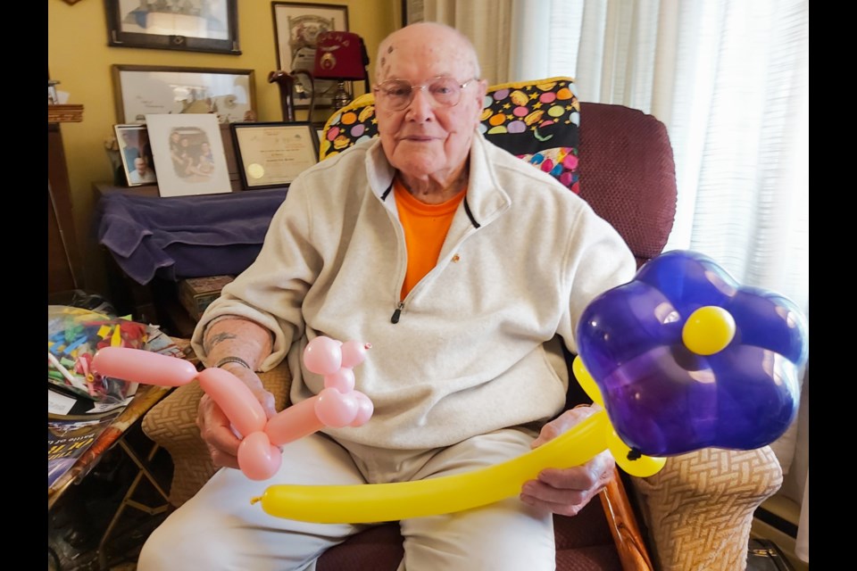 Ken Anstice, a well known Sault man — soon to turn 100 — worked at several occupations in his life and is pictured here at his home with the type of balloon shapes he enjoyed giving to countless children at community events over the years, August 31, 2022. 