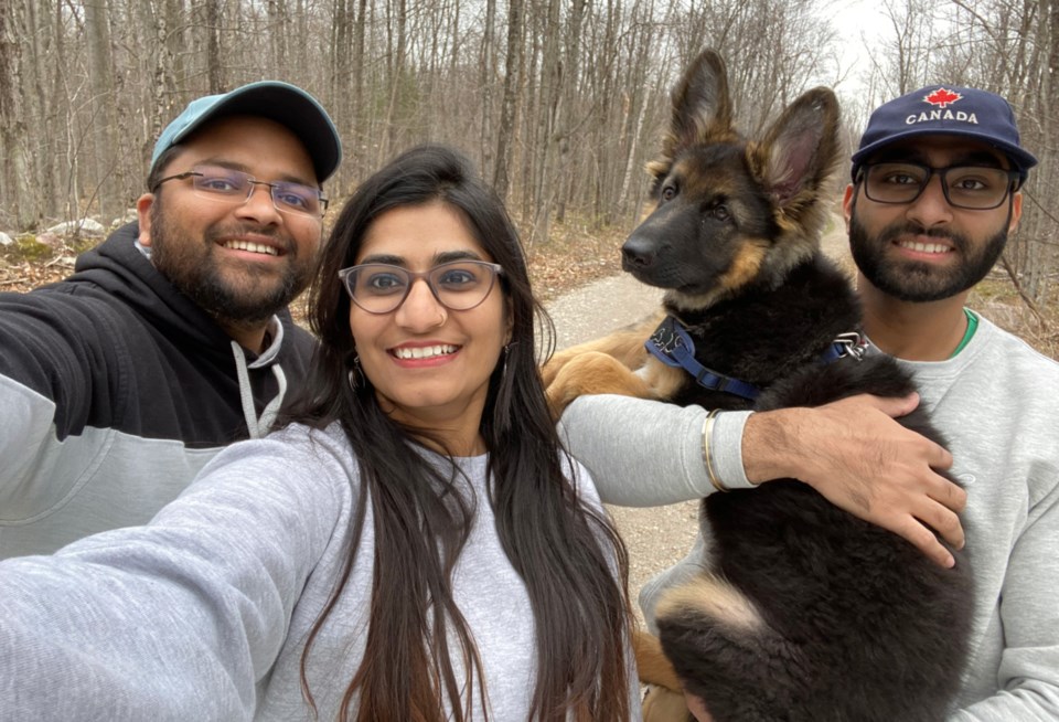 20211220-Lovleen Sharma husband Harsh, brother and dog Hunter photo supplied