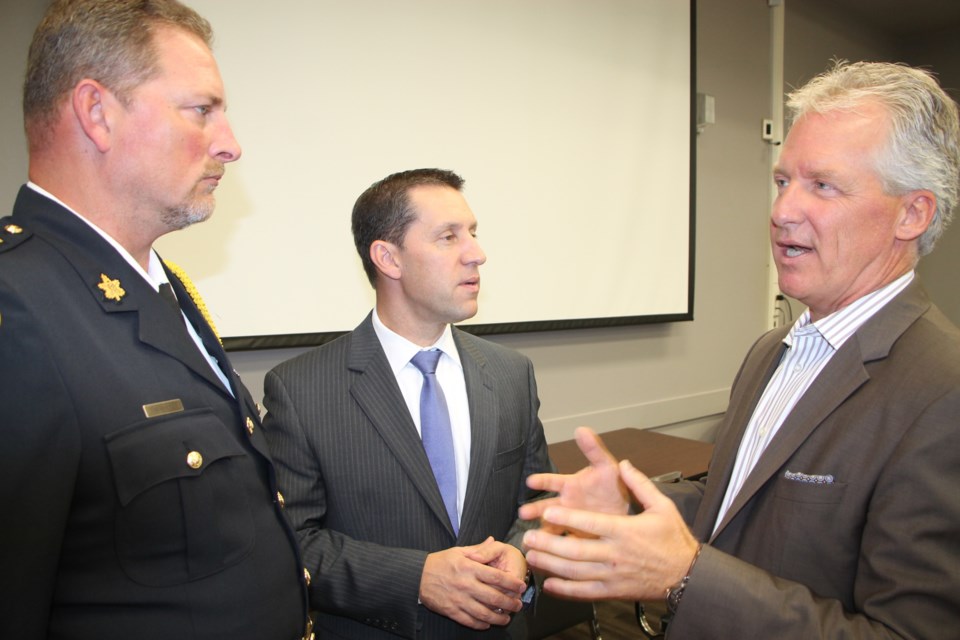 Sault Ste. Marie Police Service Inspector Mike Kenopic, Sault Ste. Marie MPP David Orazietti and Sault Area Hospital (SAH) president and CEO Ron Gagnon at an announcement regarding expansion of a partnership between Sault Police and SAH, September 29, 2016. Darren Taylor/SooToday 