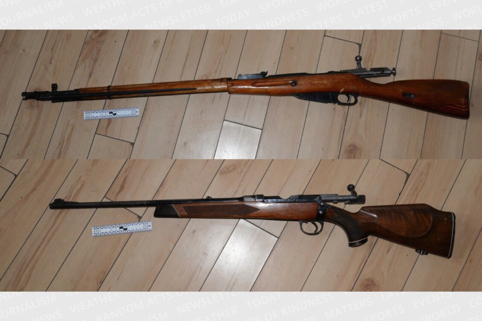 Police seized rifles during the search of an Allen Street address on May 18, 2022