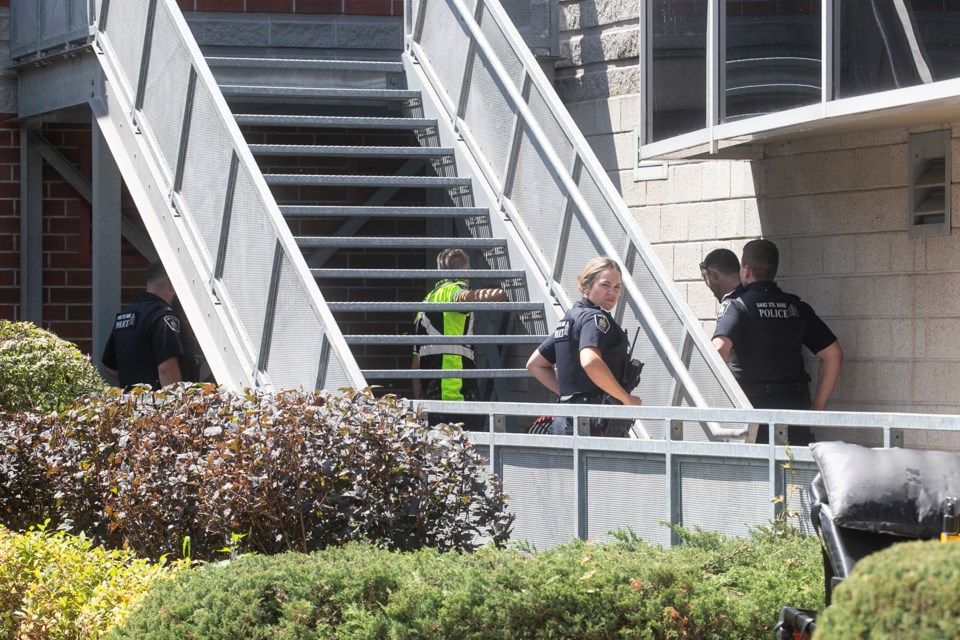 Police and paramedics respond to an unresponsive person under a stairwell at the GFL Memorial Gardens on Thursday afternoon. Police later confirmed the incident is now a sudden death investigation.