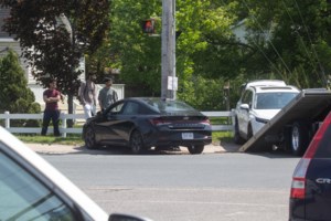Two vehicles end up on sidewalk in Sunday afternoon collision