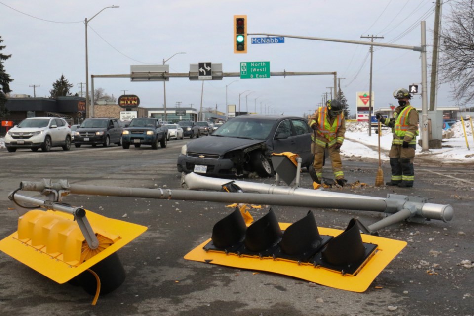 Police and fire responded to a collision that took traffic lights down and left a vehicle badly damaged at the intersection of McNabb Street and Great Northern Road Saturday afternoon. 