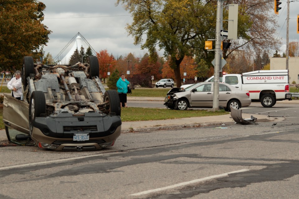 An SUV was left smashed and upside down in the middle of the road after a collision at Bay Street and Brock Street on Saturday. No one was taken to hospital said Sault Ste. Marie Fire Services Platoon Chief Jeff Lajoie. Jeff Klassen/SooToday
